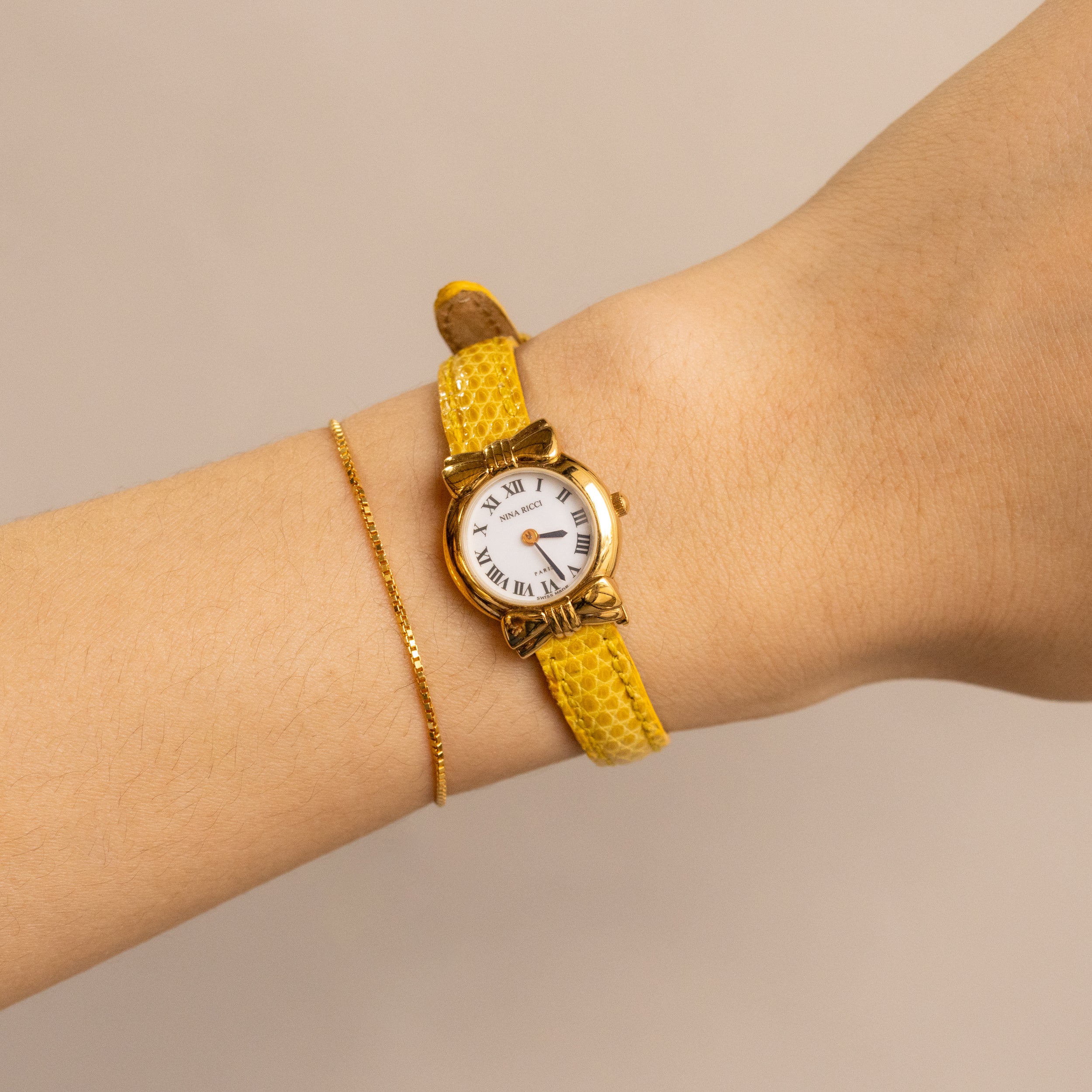 Vintage Nina Ricci Swiss Bow Strap Gold Watch