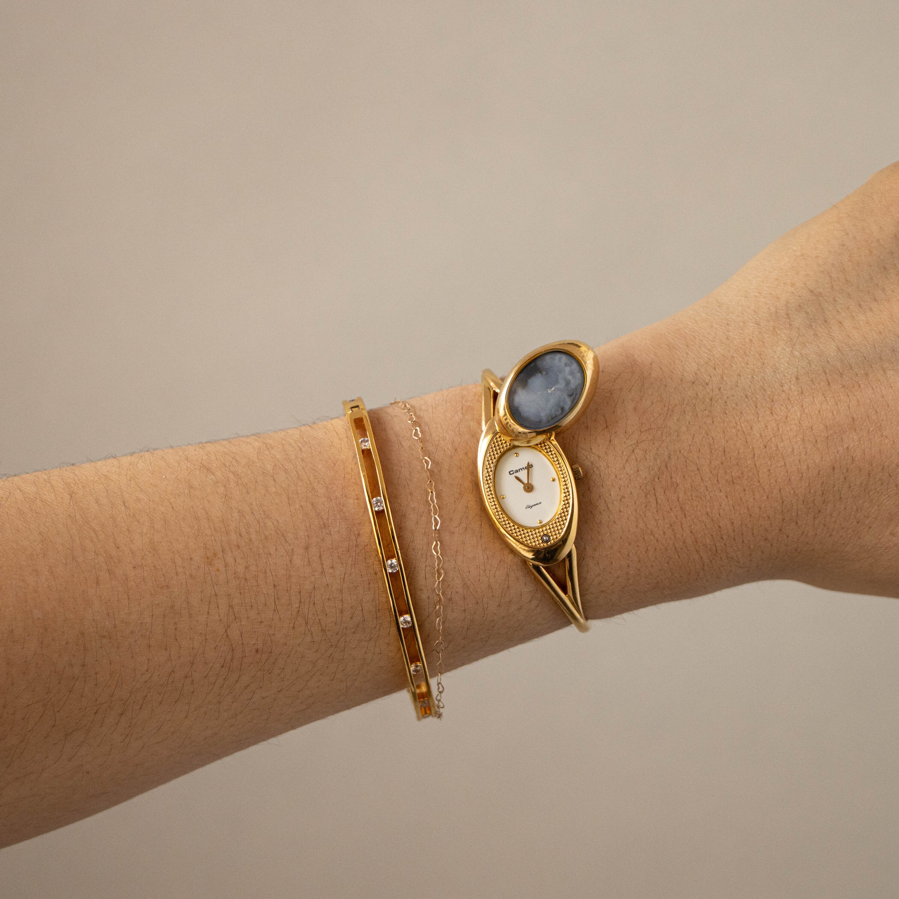 Vintage Stone Cameo Cloud Hidden Dial Gold Watch