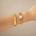 Vintage Technos Swiss Emerald Pave Gold Watch