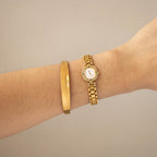 Vintage Technos Swiss Emerald Pave Gold Watch