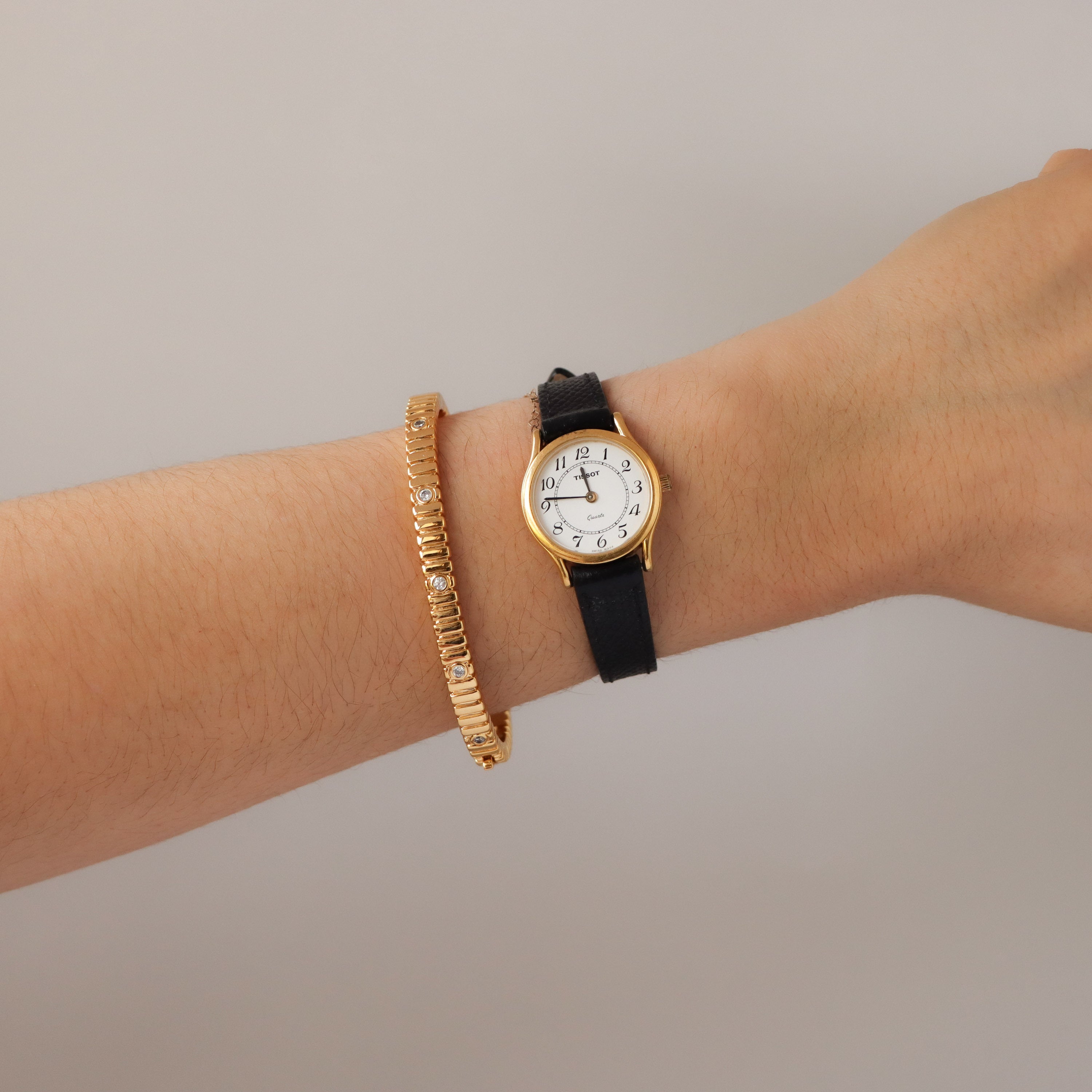 Vintage Tissot Round Black Strap Gold Watch