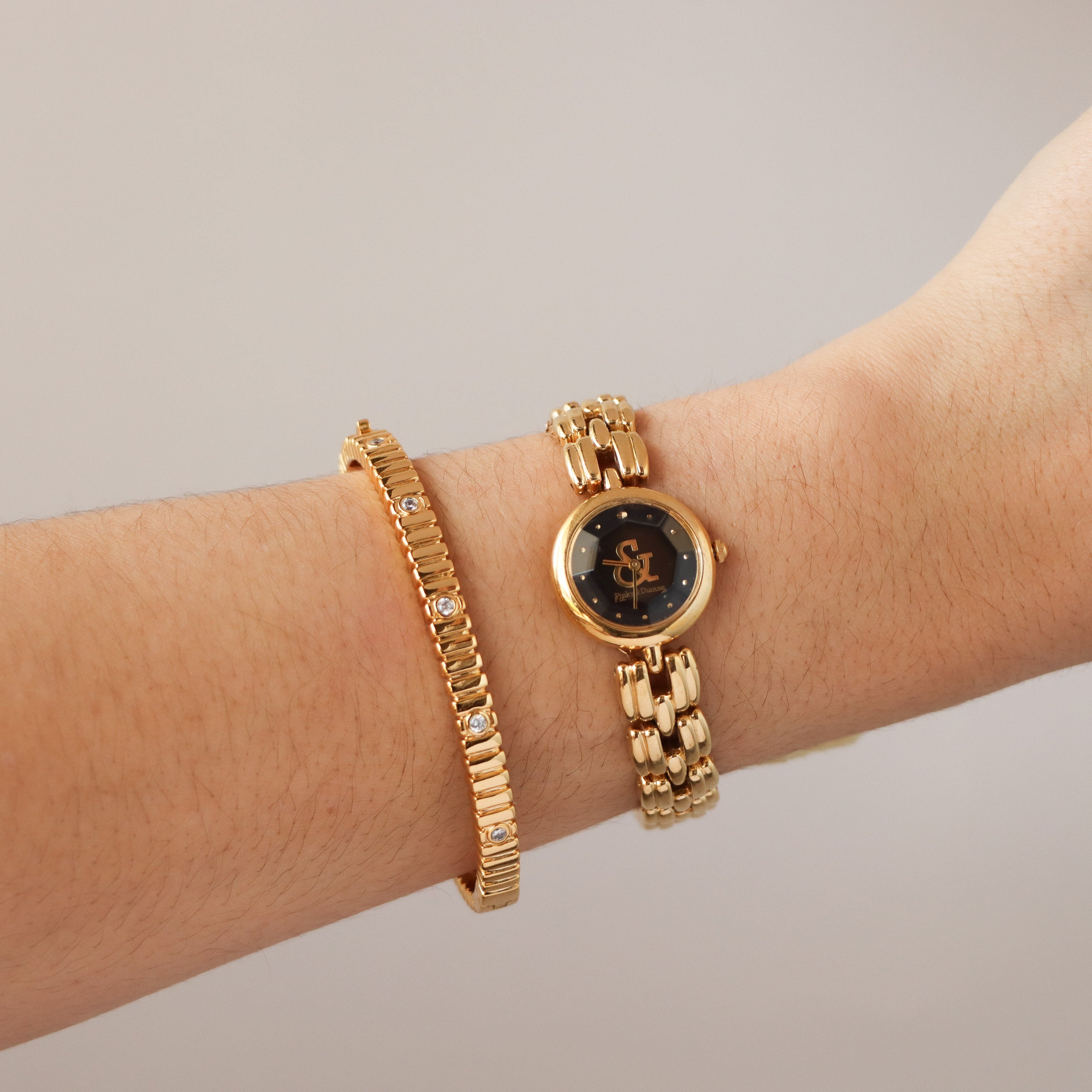 Vintage Pinky & Dianne Midnight Gold Watch
