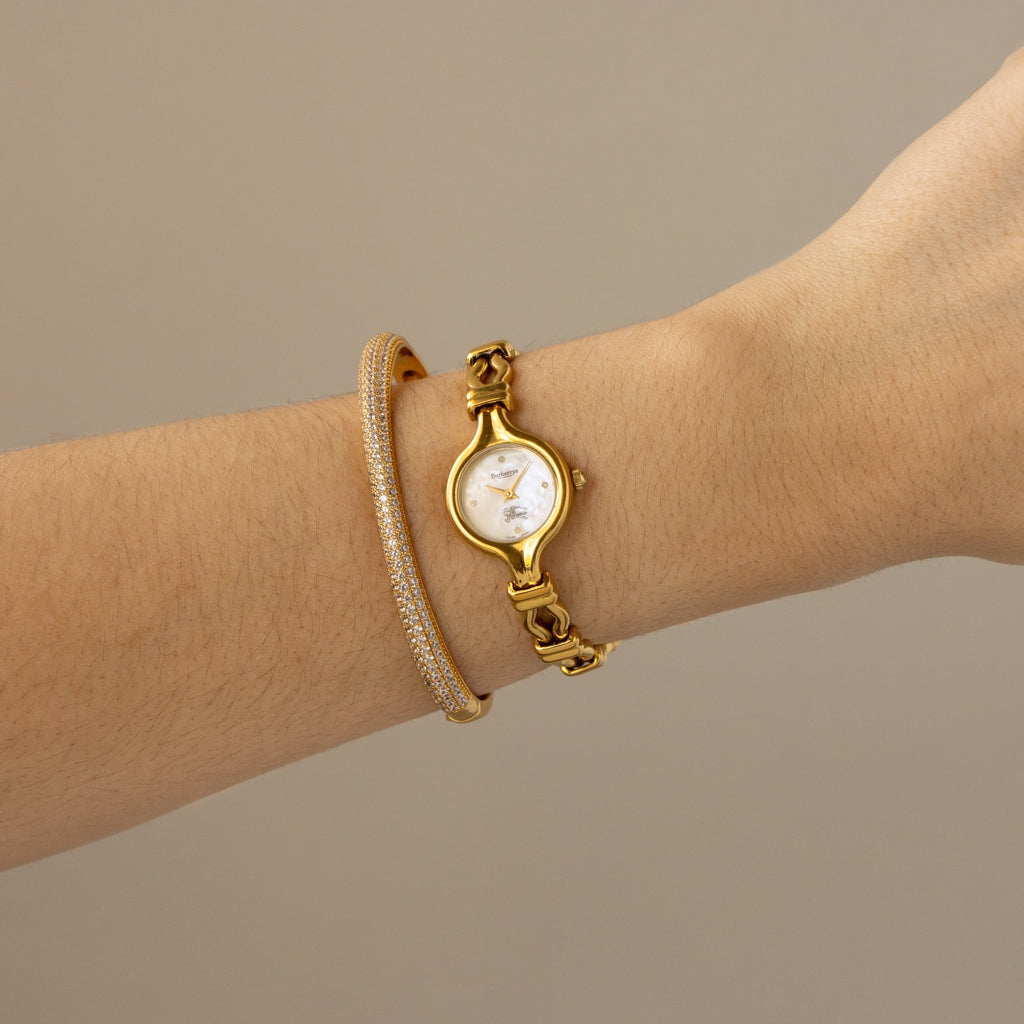 Vintage Burberrys Swiss Equestrian Gold Watch