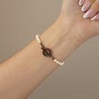 Vintage 4°C Pearl Toggle Gold Watch