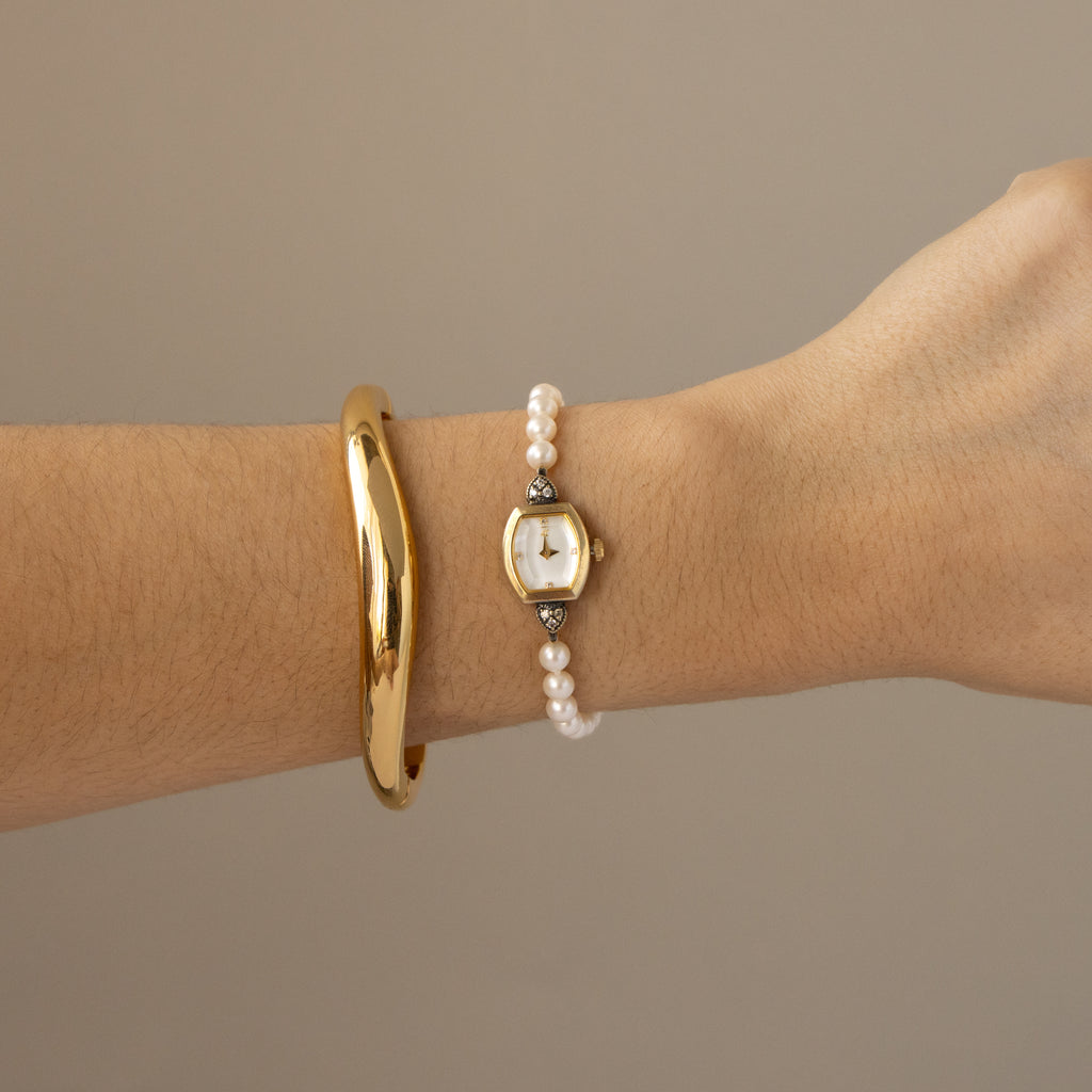 Vintage 4°C Pearl Toggle Gold Watch