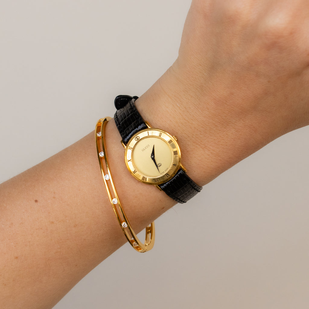 Vintage Gucci Swiss Roman Strap Gold Watch