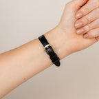 Vintage Seiko Roman Black Strap Gold Watch