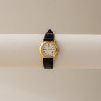 Vintage Seiko Roman Black Strap Gold Watch
