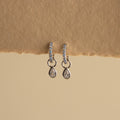 Aquamarine Diamond Teardrop Huggies in Silver