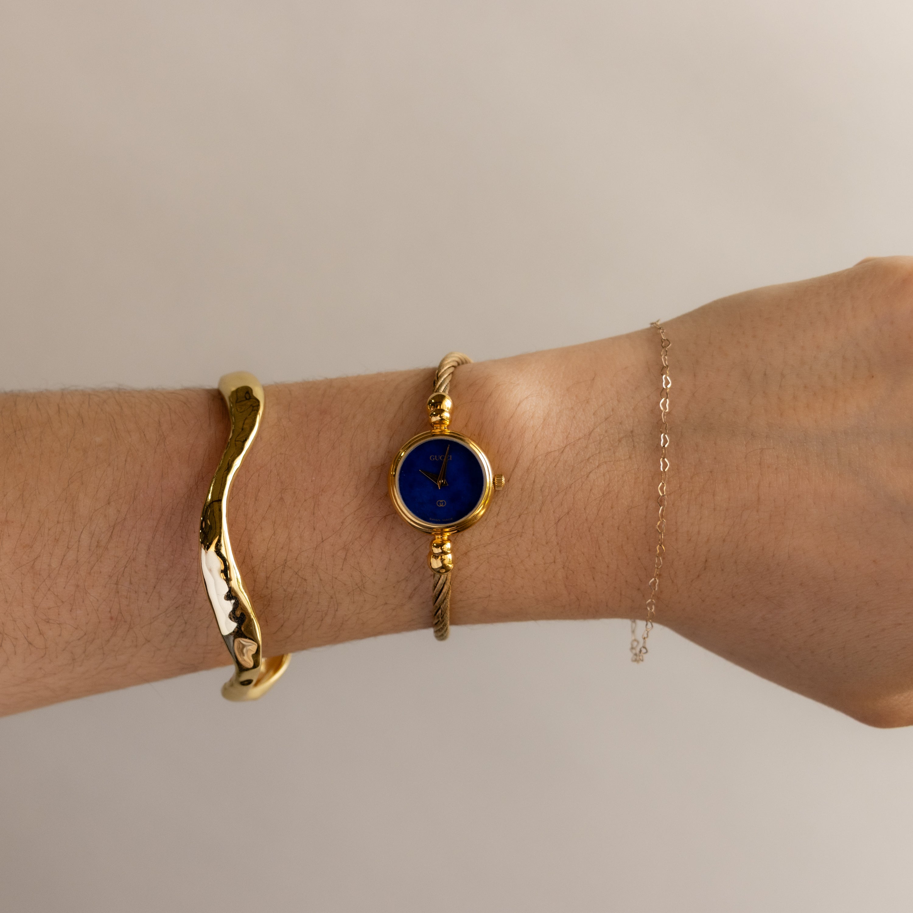 Vintage Gucci Swiss Blue Dial Rope Gold Watch