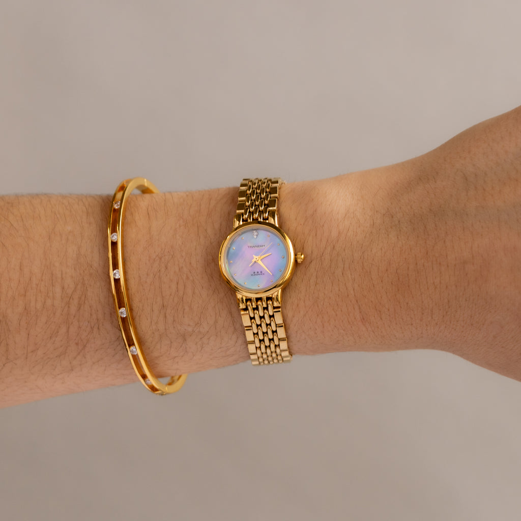 Vintage Tranzam Round Ocean Pearl Gold Watch