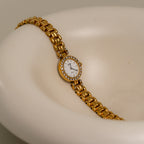 Vintage Technos Pave Round Gold Watch