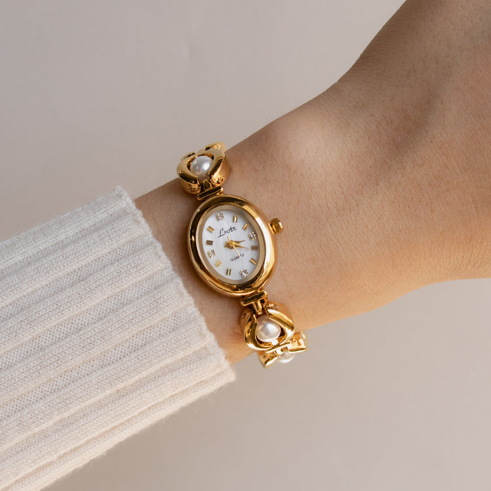 Vintage Lsvtr Oval Pearl Gold Watch