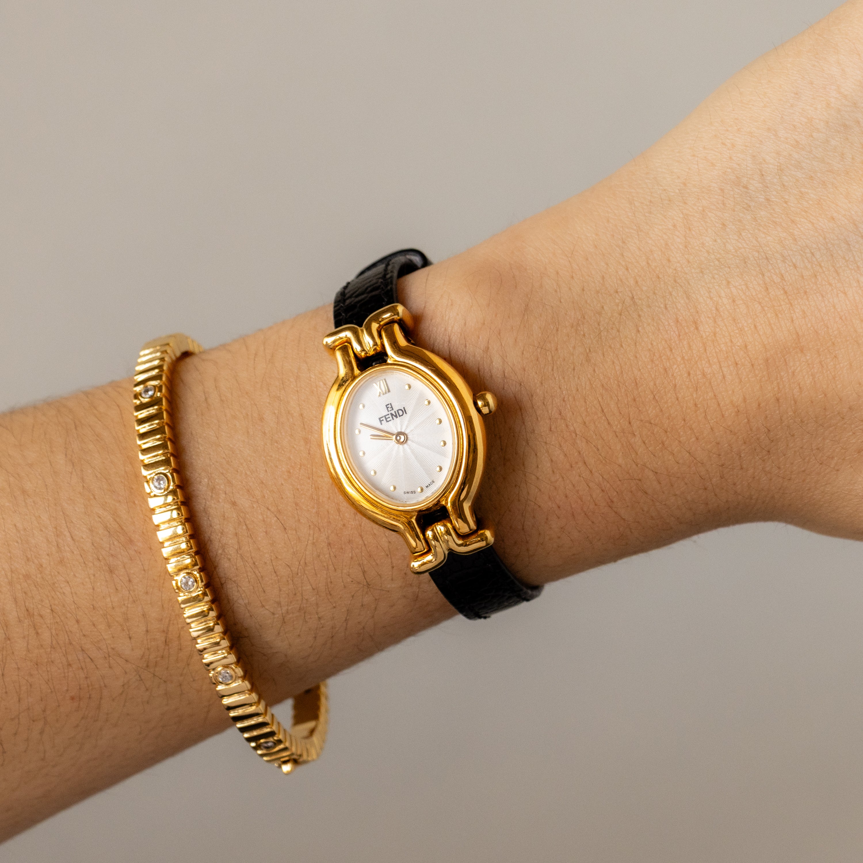 Vintage Fendi Swiss Oval Black Leather Gold Watch