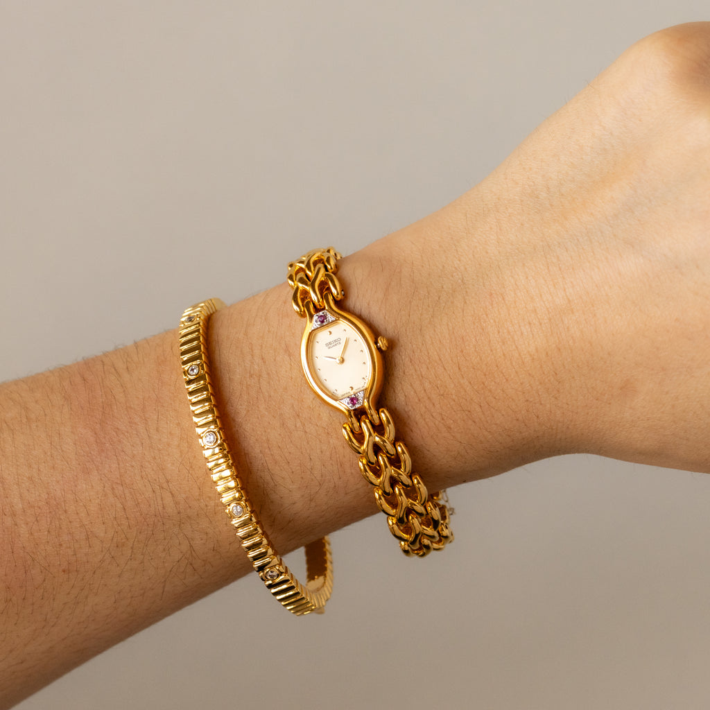 Vintage Seiko Oval Ruby Chainlink Gold Watch