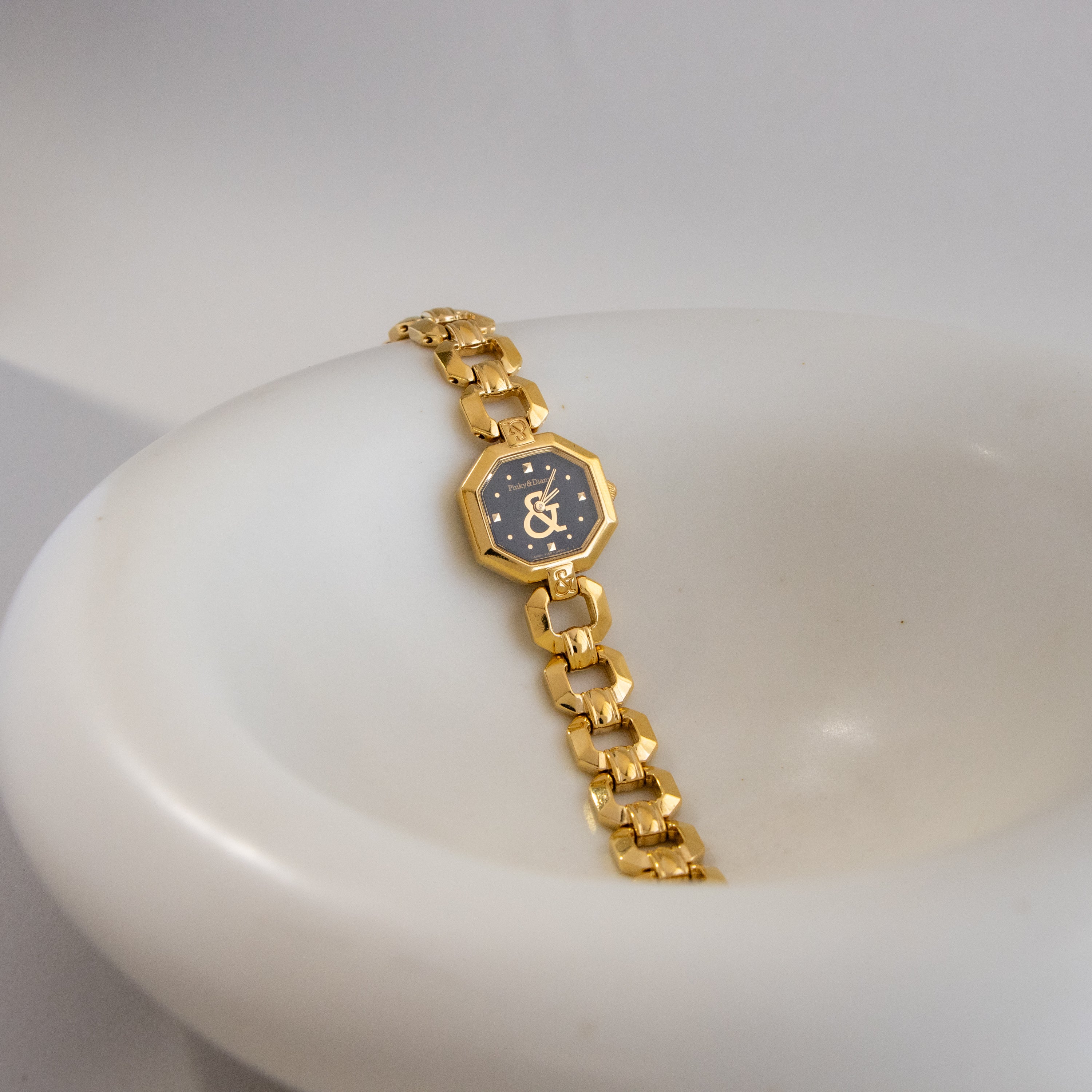 Vintage Pinky & Dianne Midnight Gold Watch