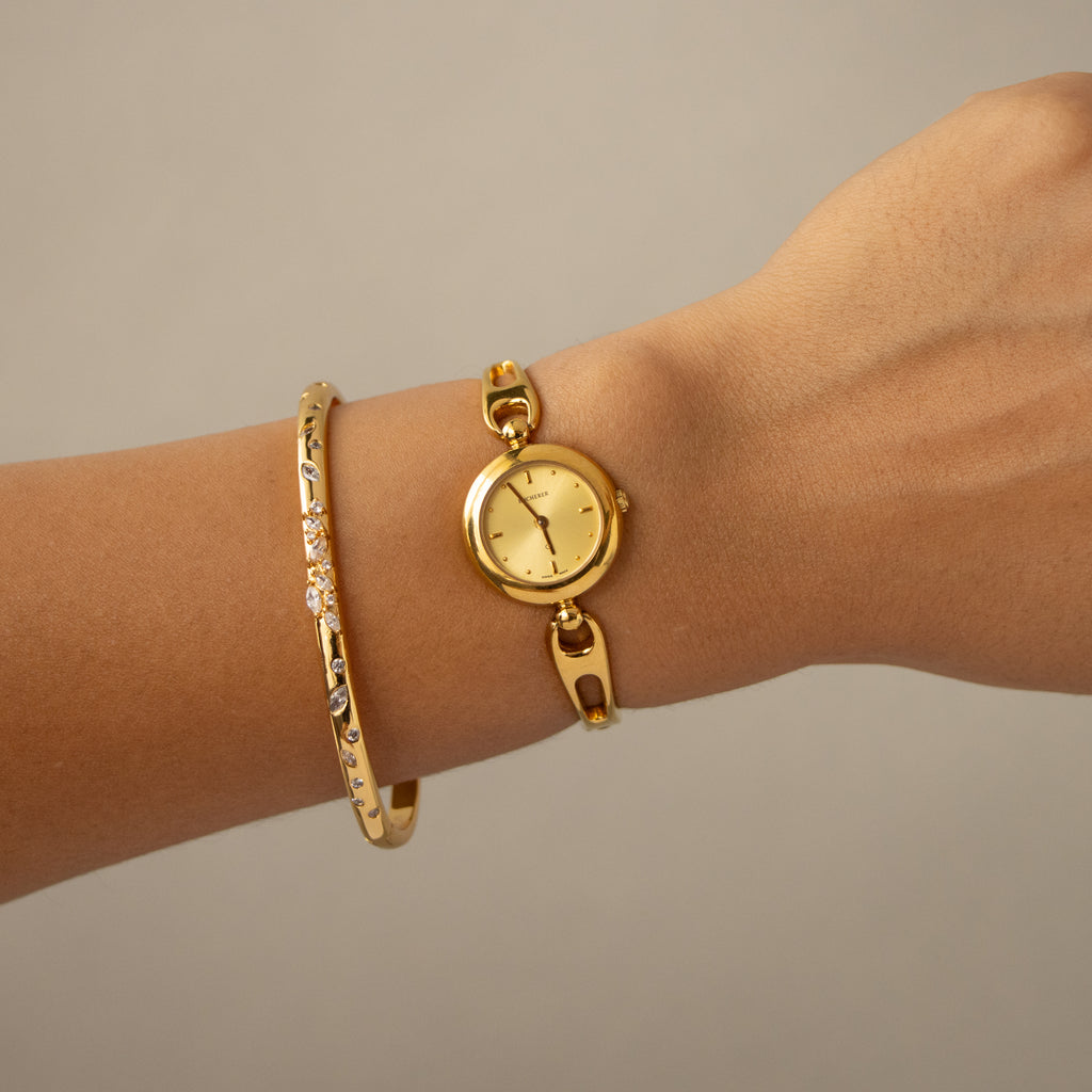 Vintage Bucherer Swiss Slim Round Gold Watch