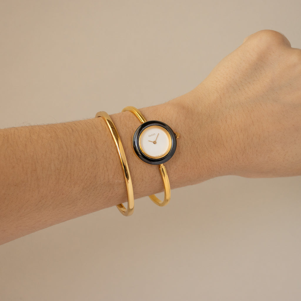 Vintage Gucci Swiss Black Bezel Cuff Gold Watch