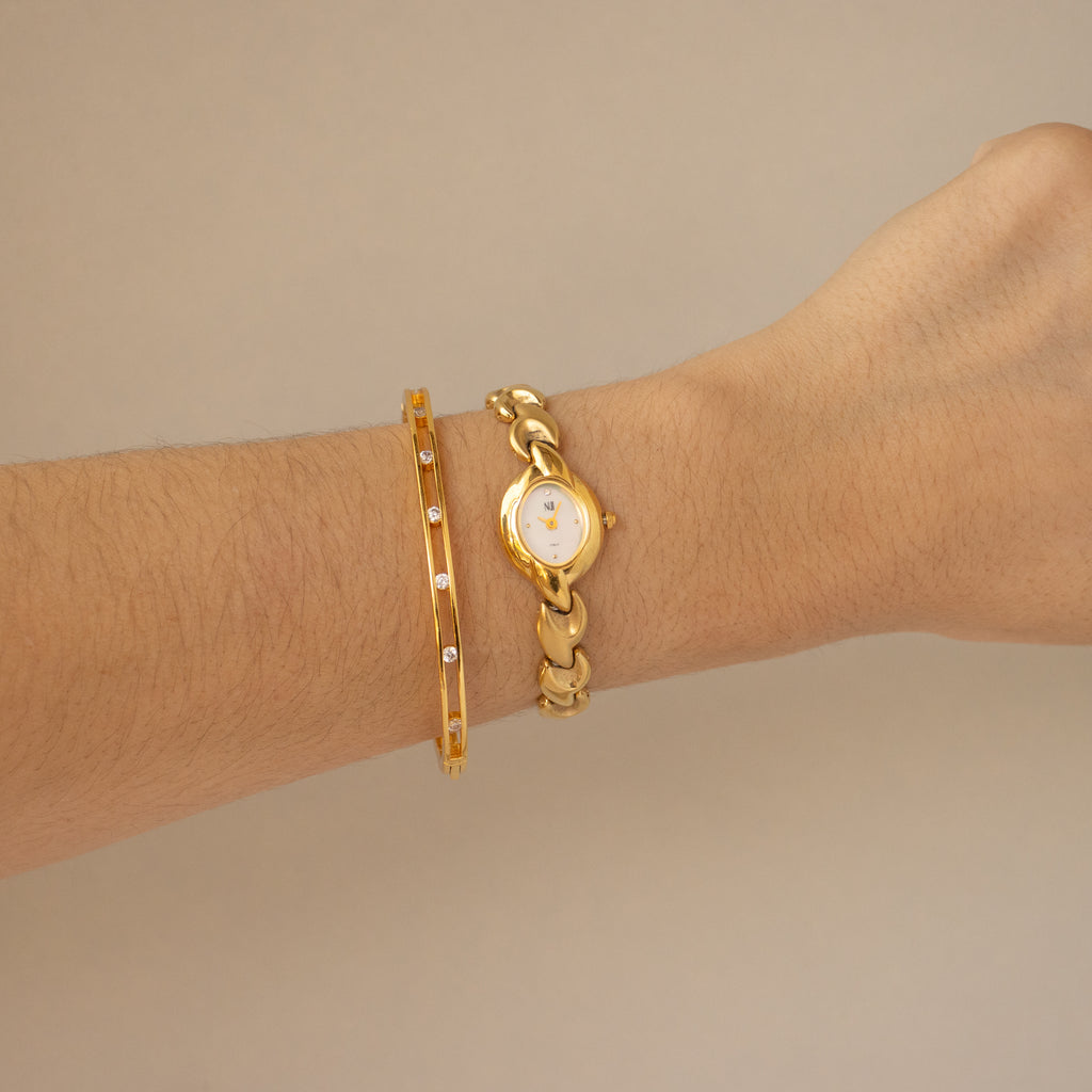 Vintage Nui Oval Gold Watch