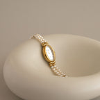 Vintage Elizabeth Oval Pearl Gold Watch