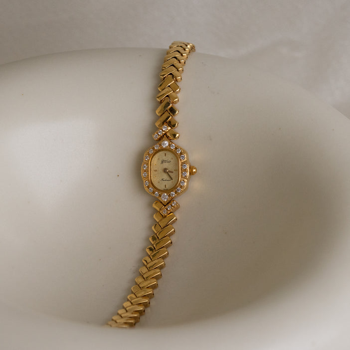 Vintage Technos Swiss Pave Gold Watch