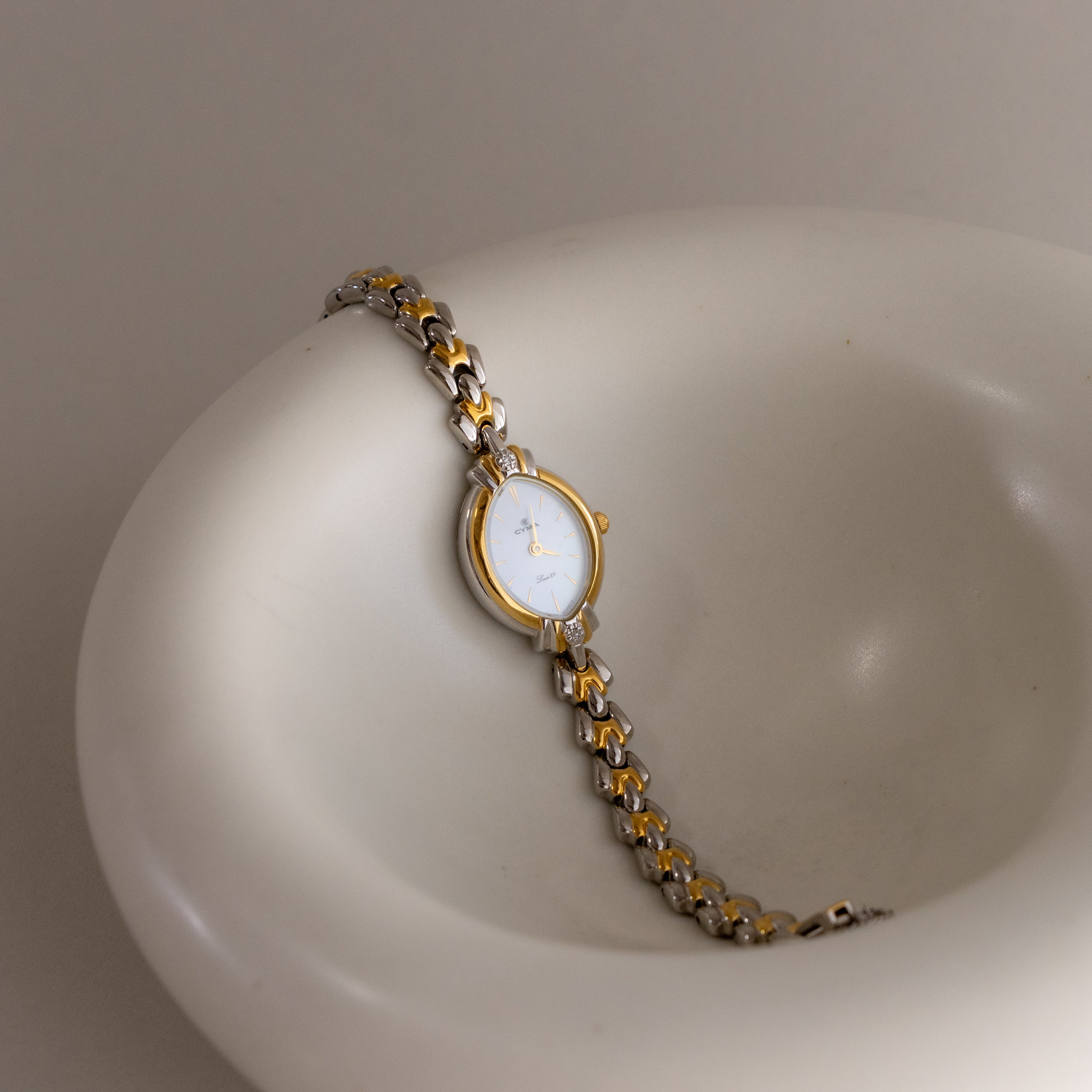 Vintage CYMA Swiss Oval Two Tone Watch