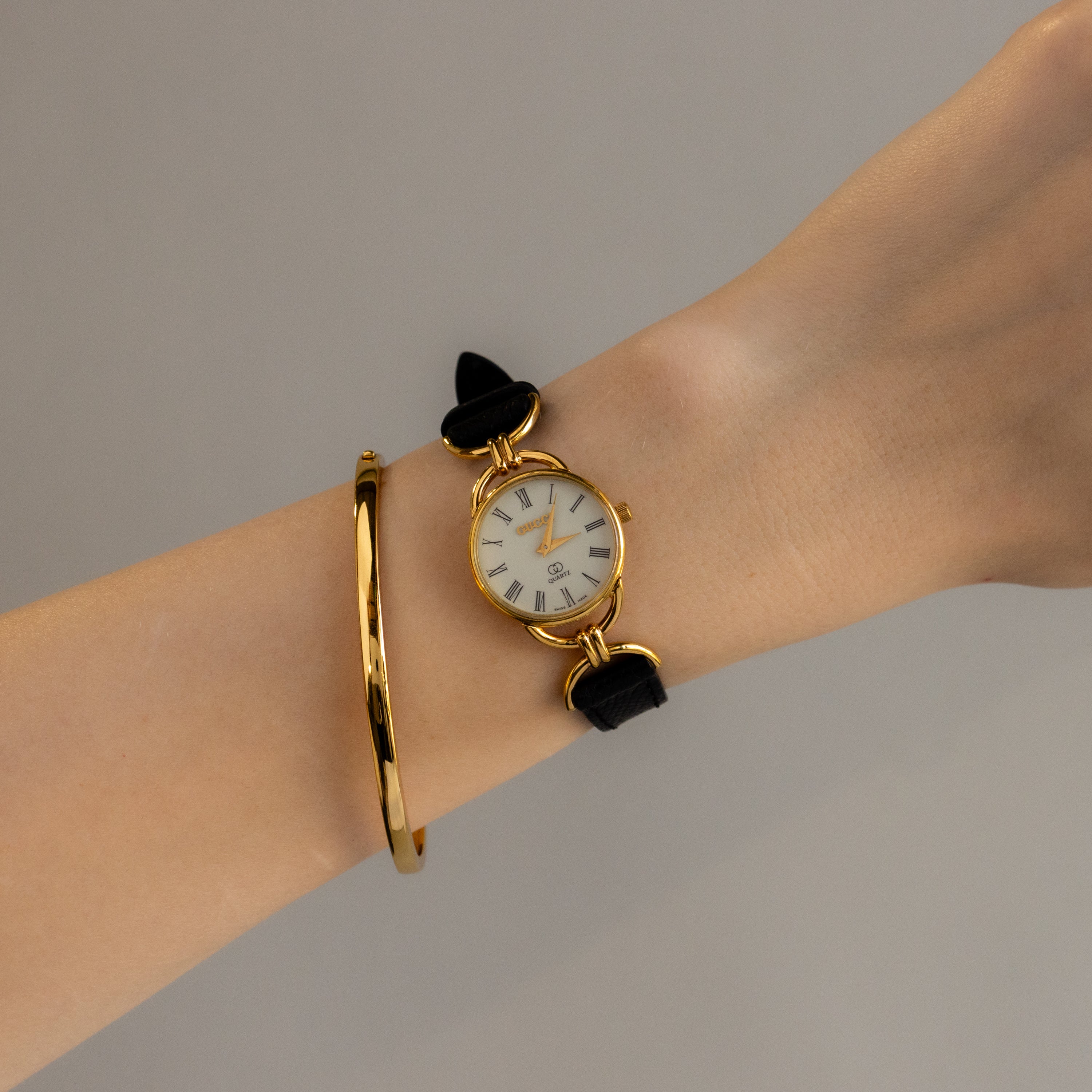 Vintage Gucci Swiss Black Strap Gold Watch