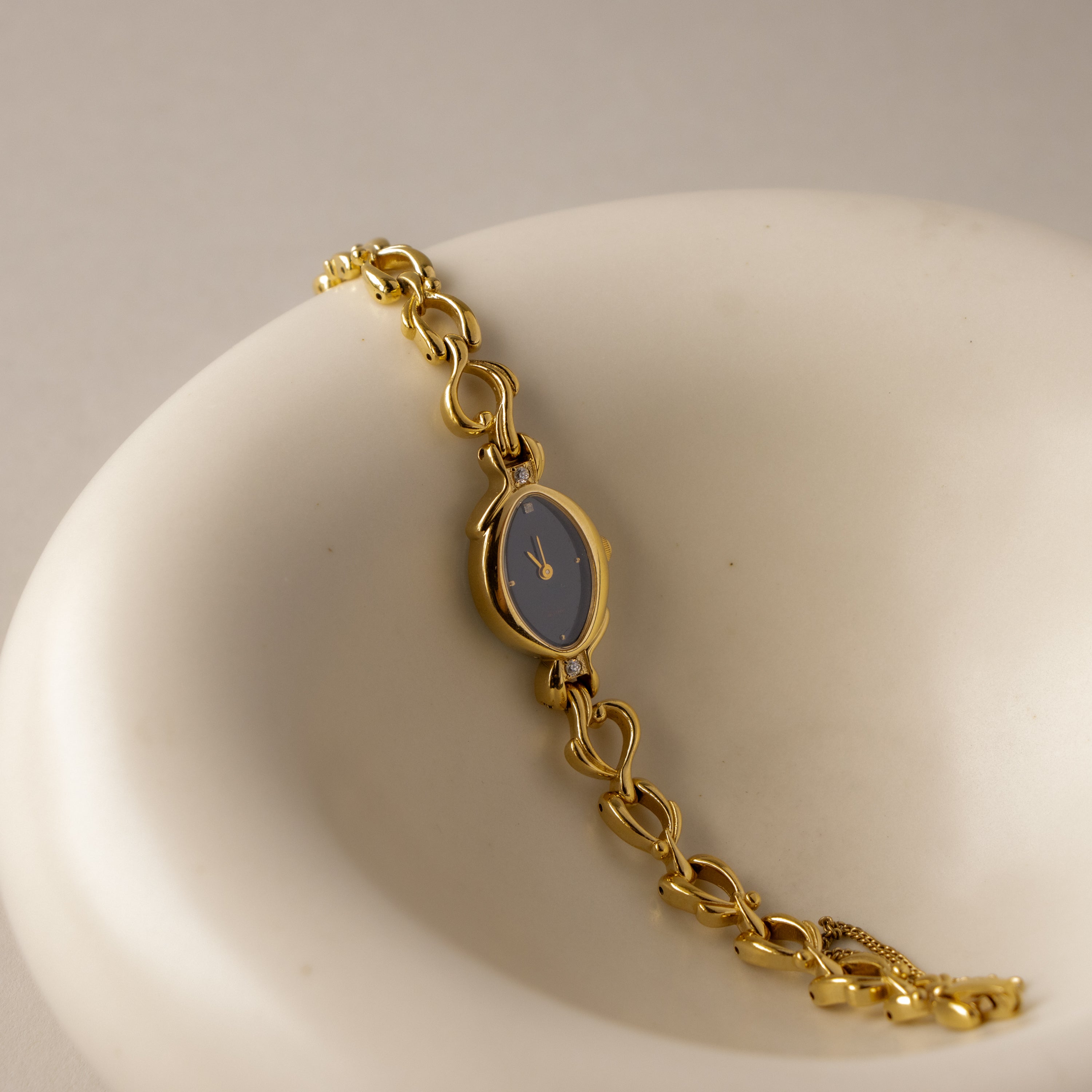 Vintage Rhythm Midnight Oval Gold Watch