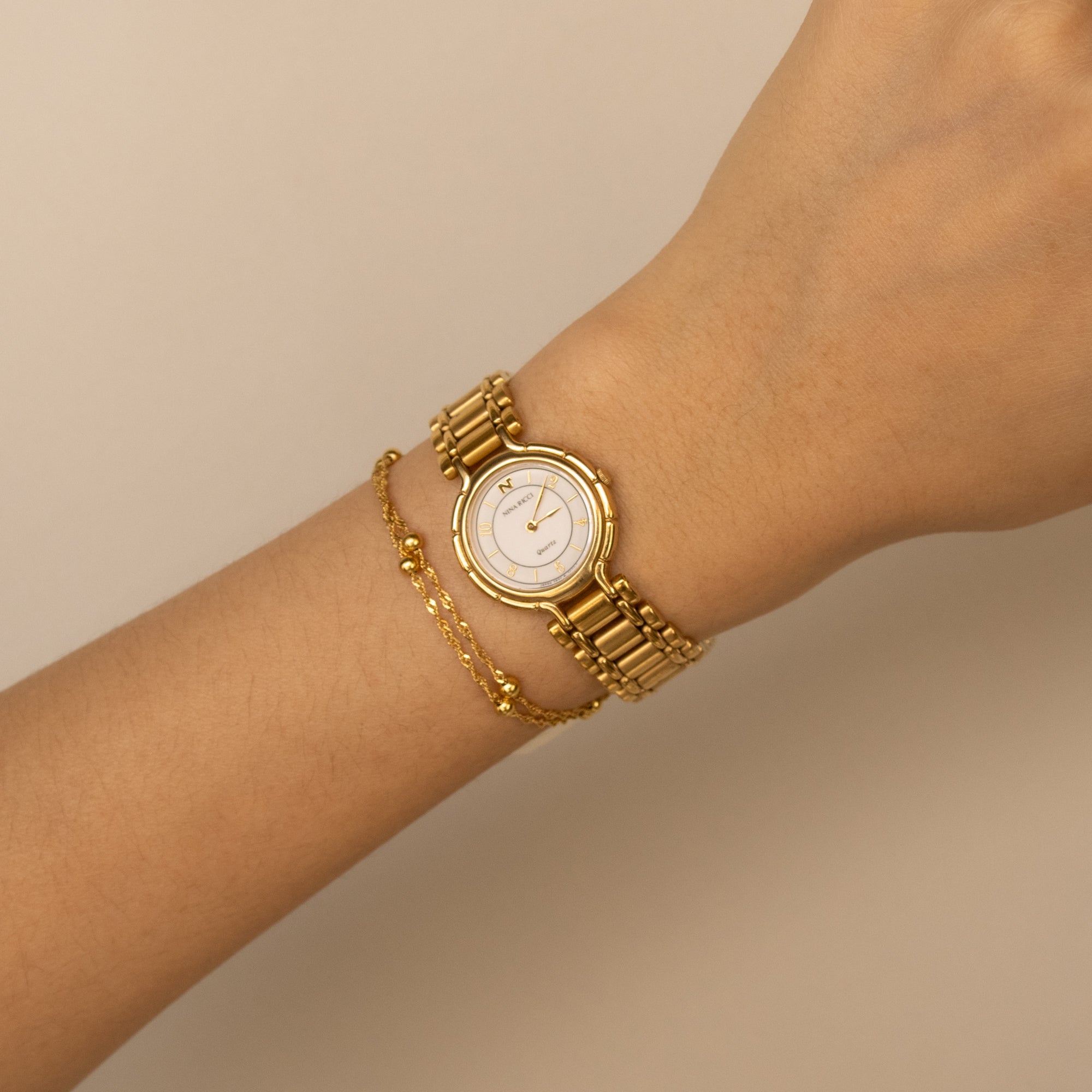 Vintage Nina Ricci Round Gold Watch