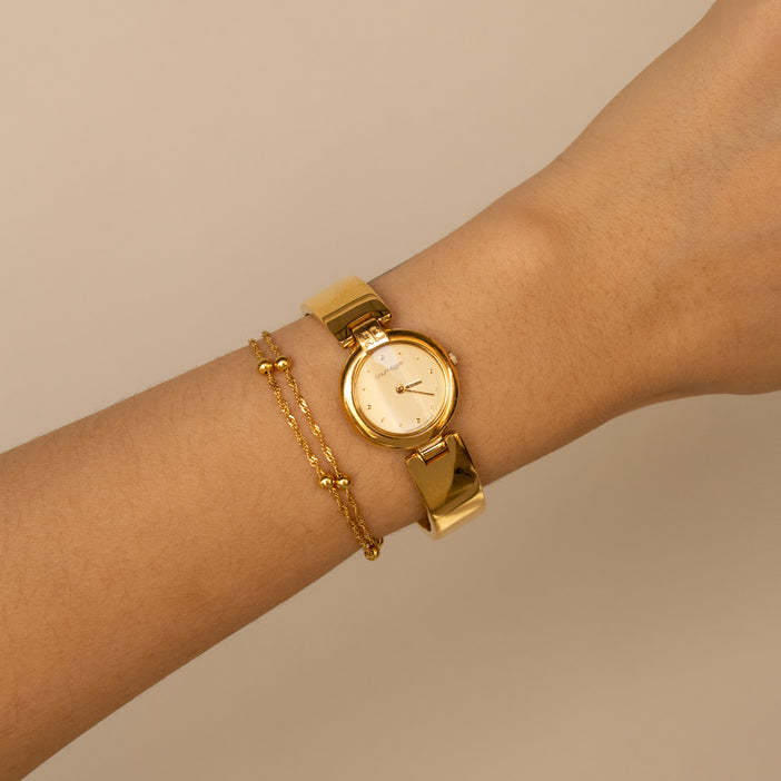 Vintage Courreges Round Cuff Gold Watch