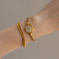 Vintage Gucci Swiss Shell Coil Gold Watch