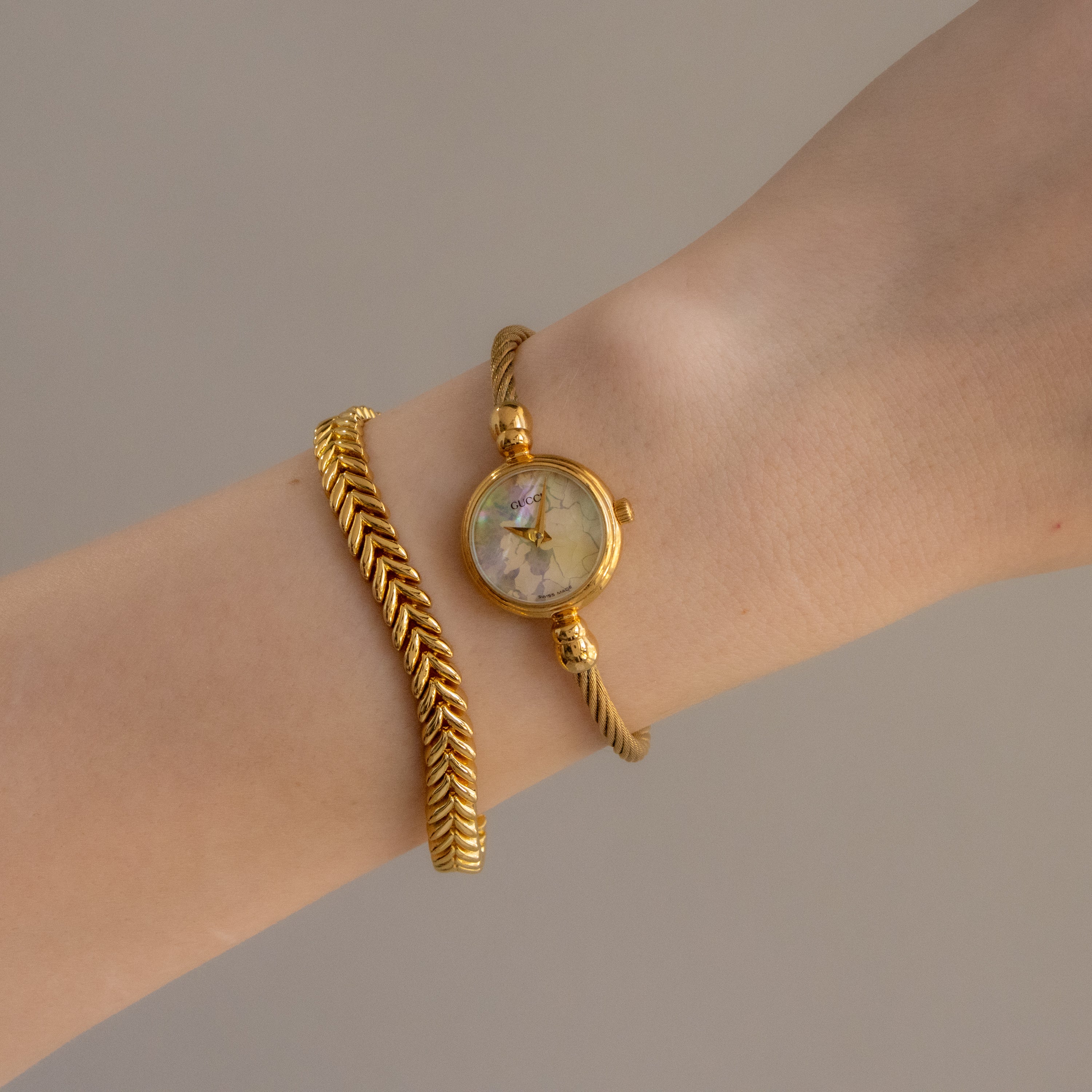 Vintage Gucci Swiss Shell Coil Gold Watch