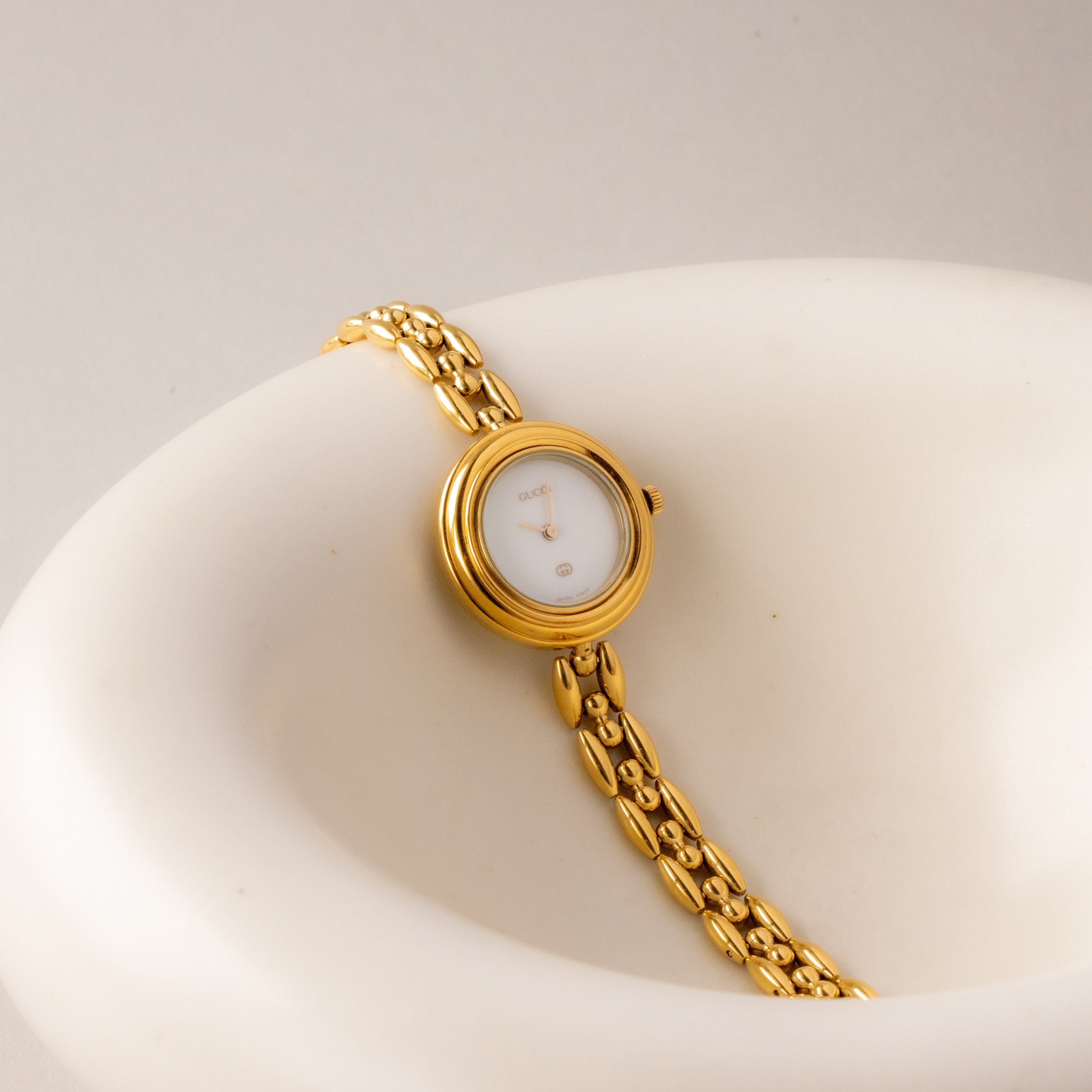 Vintage Gucci Swiss Teal Bezel Gold Watch