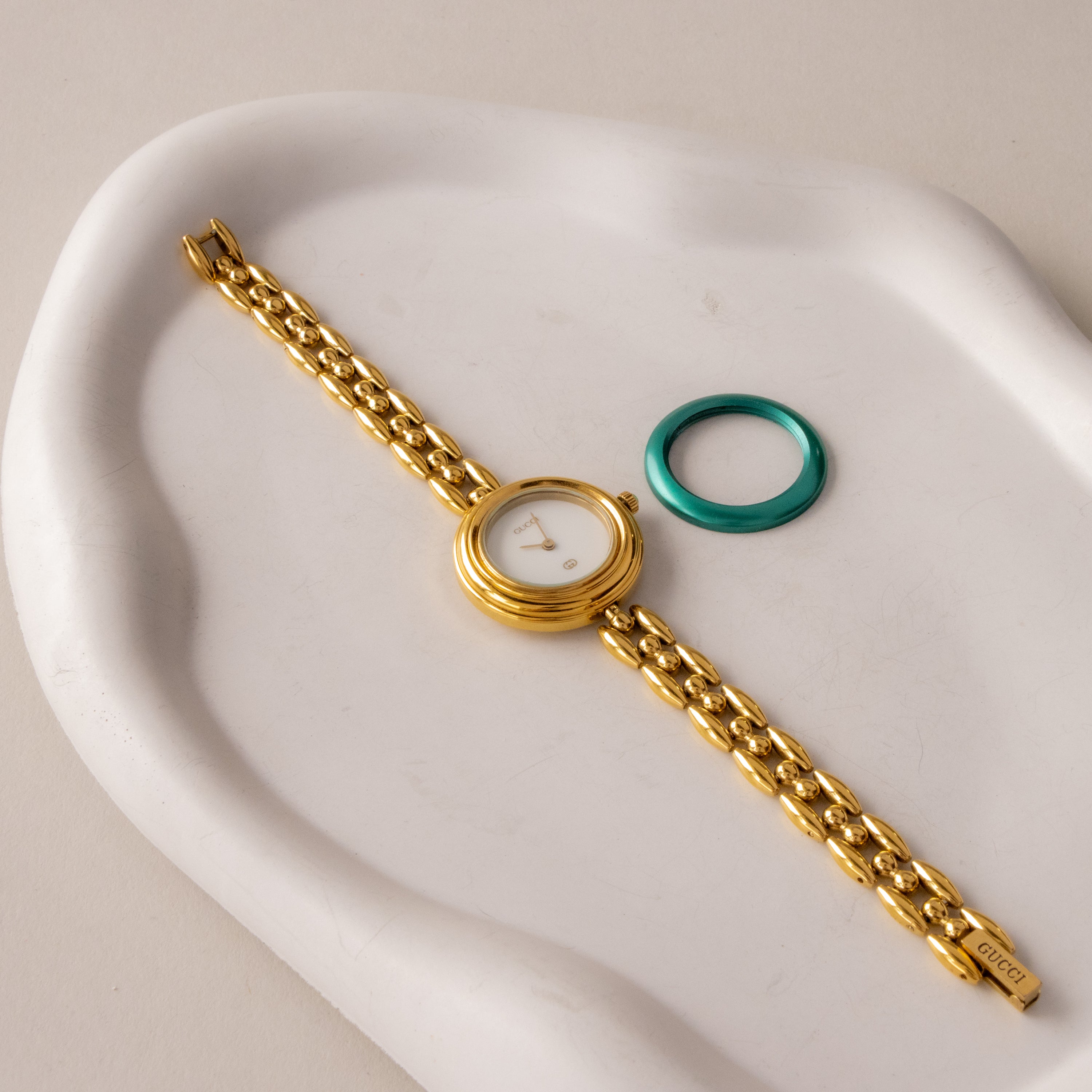 Vintage Gucci Swiss Teal Bezel Gold Watch
