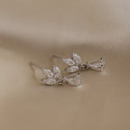 Aretes colgantes con diamantes de talla marquesa