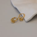 Dangling Blossom Huggies in 18K Gold