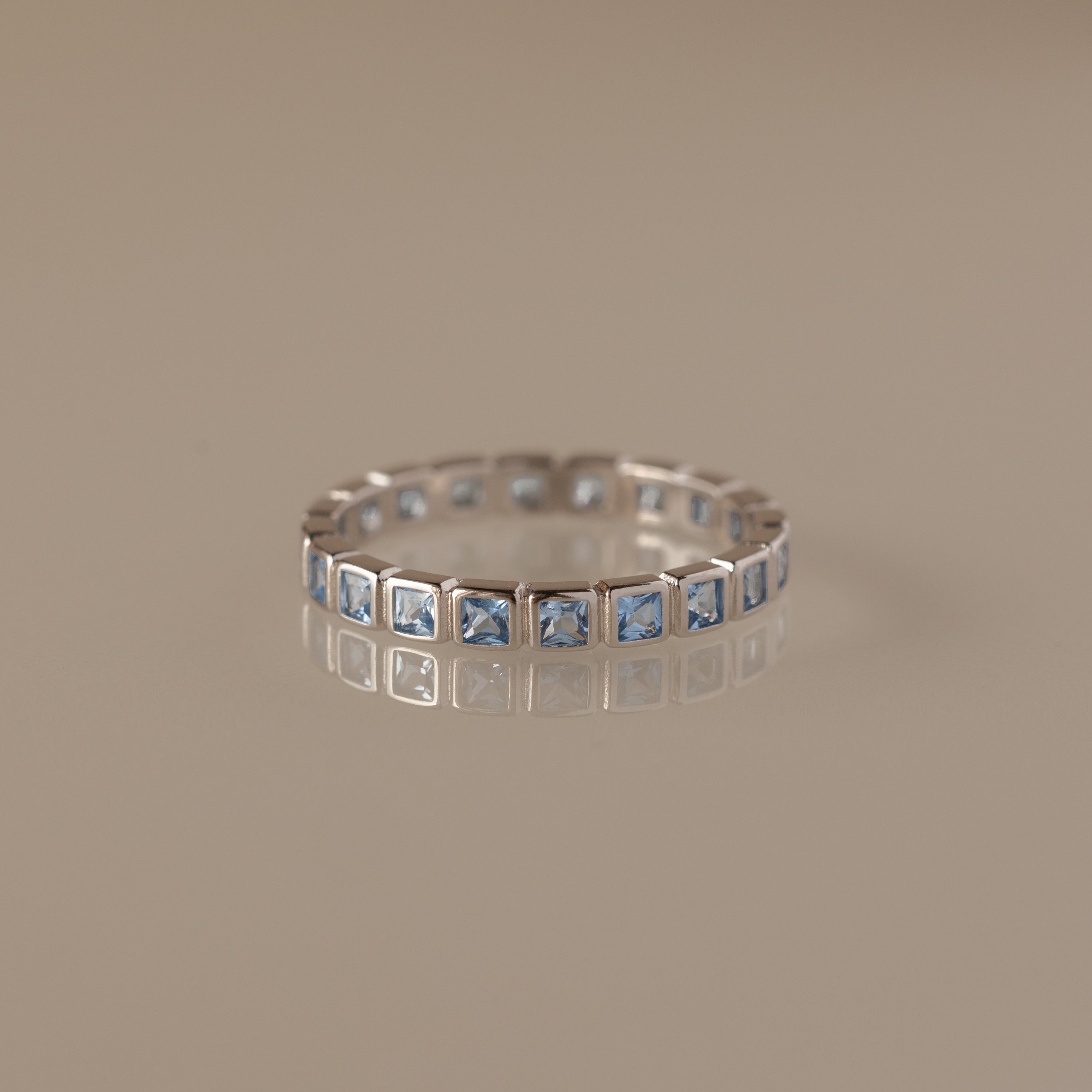 Eternity Bezel Blue Zircon Ring