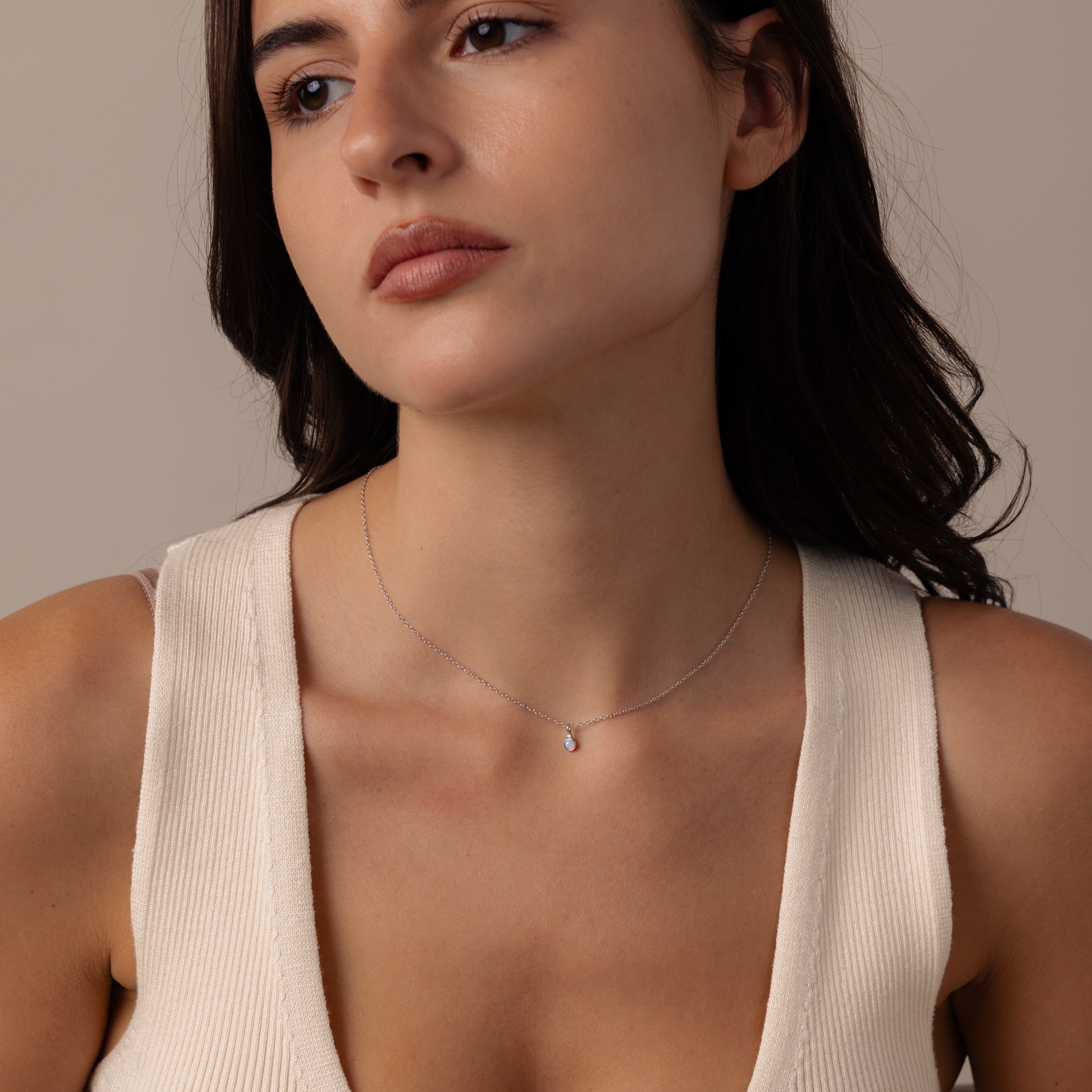 Model wearing our Opal Diamond Necklace in Silver