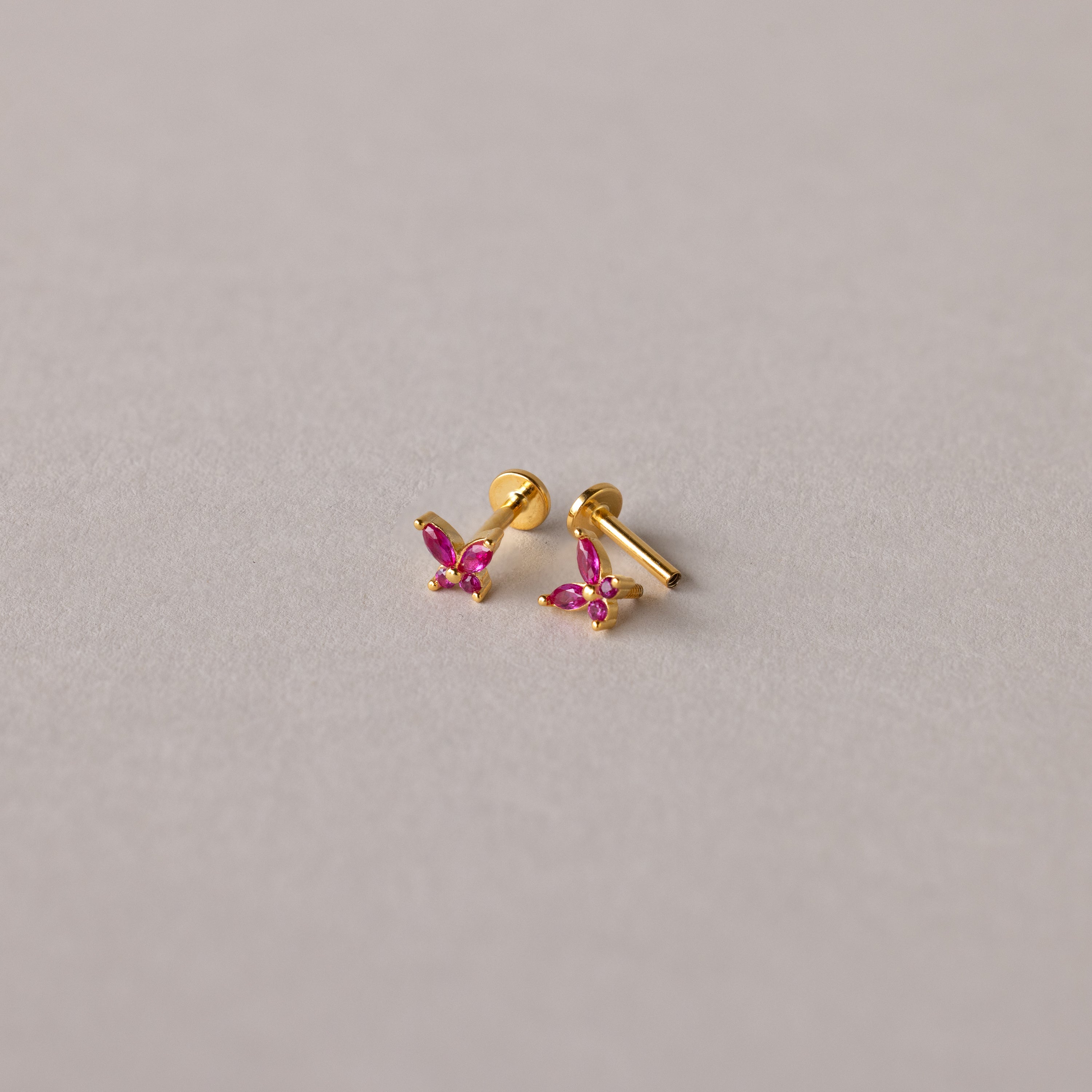 Butterfly Blue Zircon Flatback Studs are displayed on a plain light gray background.