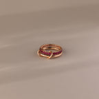 Duo Ruby Tennis Linked Ring Set—features minimalist gold bands linked and adorned with pink gemstones, creating an elegant heart-inspired design perfect as a birthstone ring for any occasion.