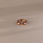 Duo Alexandrite Tennis Linked Ring Set with purple gemstones and an intertwined band design, displayed on a neutral background.