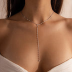 Model wearing a silver dainty Sparkling Diamond Lariat Necklace, which features a delicate mirror chain design with two CZ diamond stones.