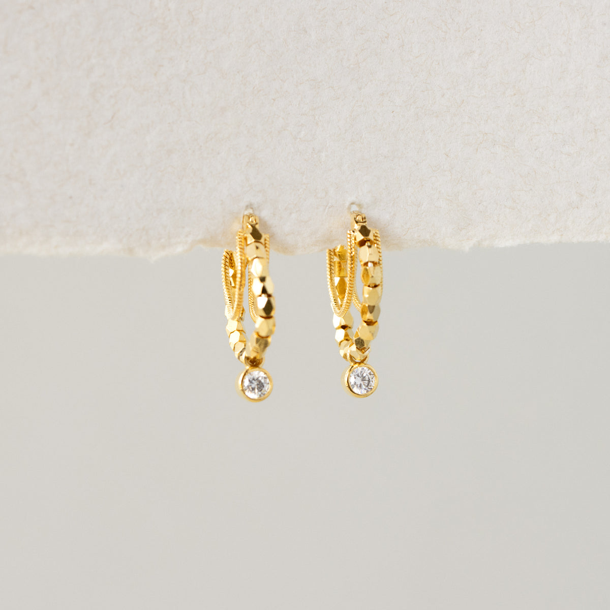 Geometric Diamond Chain Drop Huggies