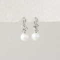 Diamond Knot Pearl Drop Earrings in Silver