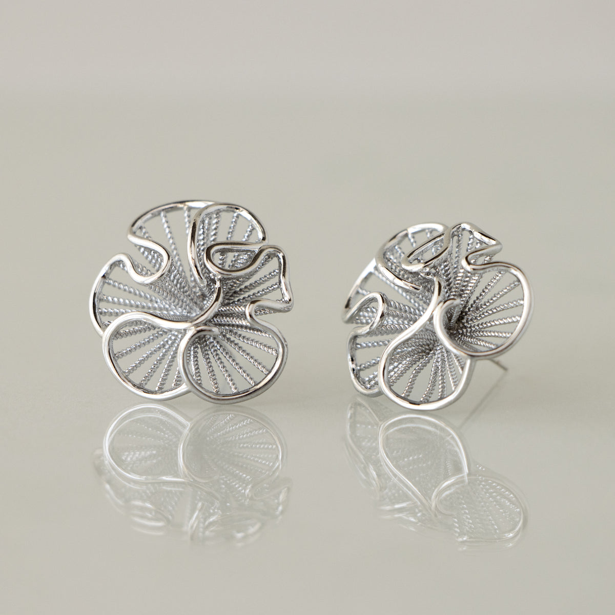 Ruffled Flower Studs in Silver