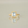 Emerald Cut Aquamarine Halo Ring