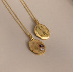 The Organic Fingerprint Multi Birthstone Necklace features two gold pendants—one plain, one textured with birthstones—creating a meaningful personalized keepsake and perfect family necklace for treasuring special memories.