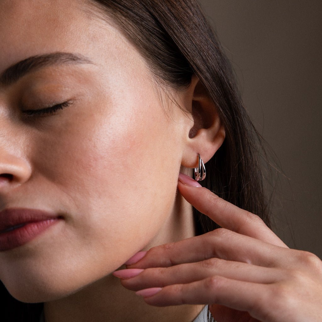 Model wearing our Oval Duo Hoops in Silver