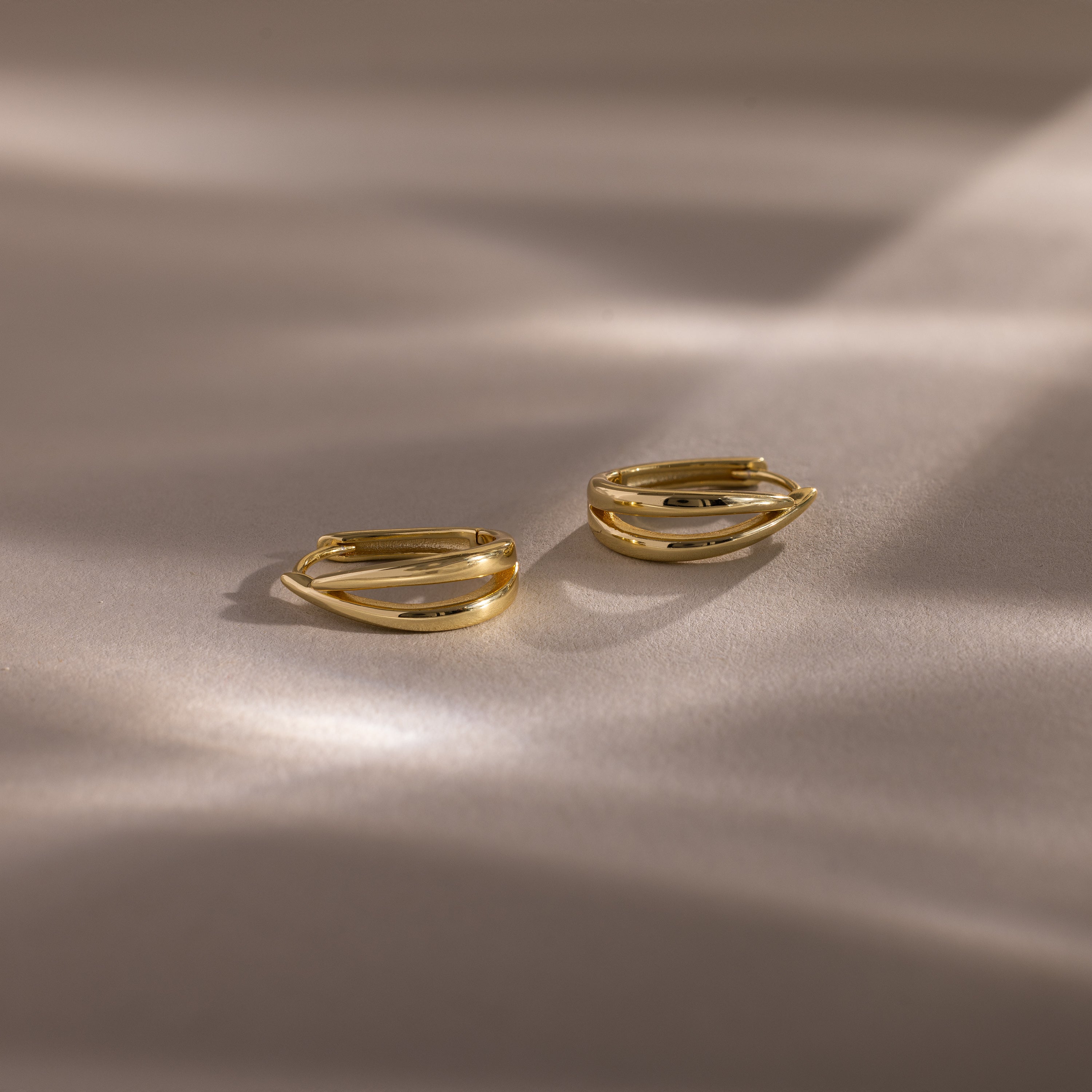 Close up of our Oval Duo Hoops in Gold