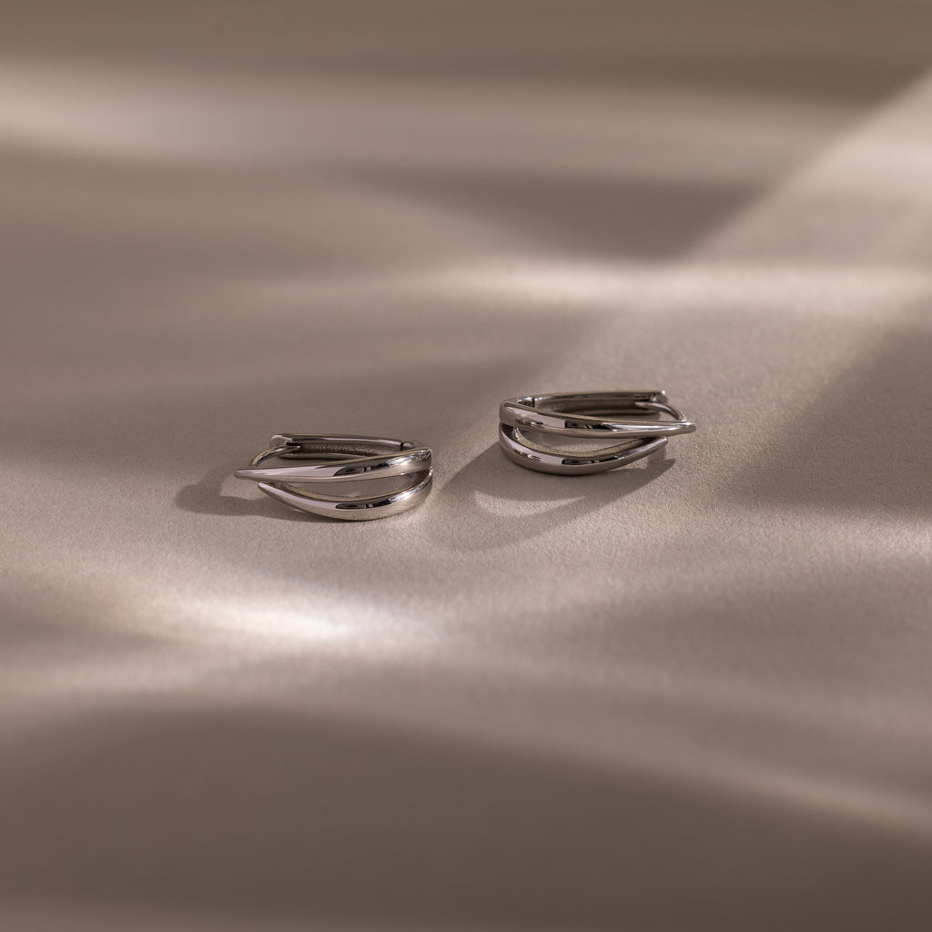 Close up flatlay of our Oval Duo Hoops in Sterling Silver